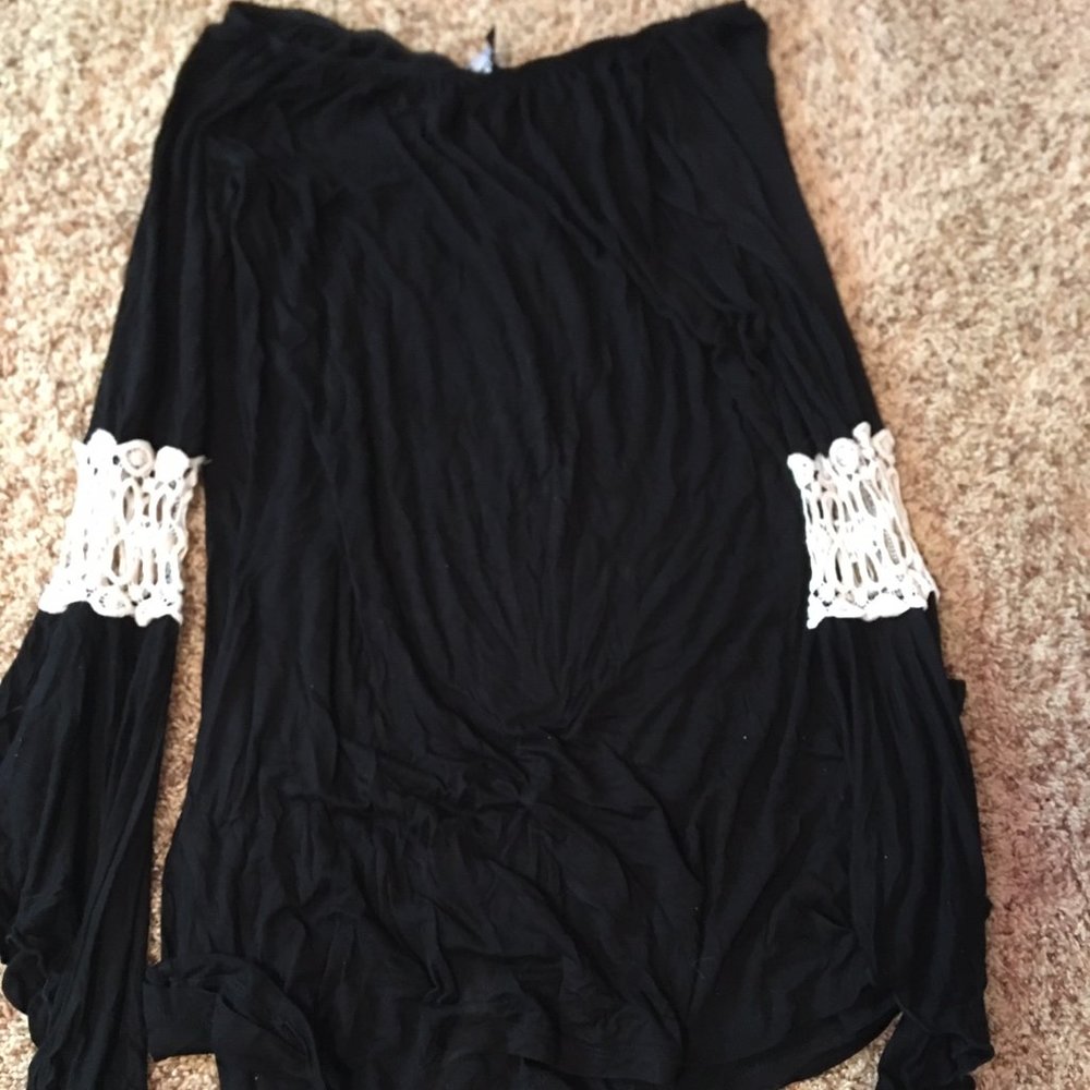 Black off the shoulder blouse with lace elbow